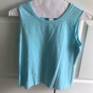 Sleeveless top with rhinestones.